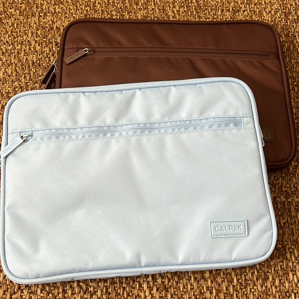 (2) brand new calpak laptop pouches